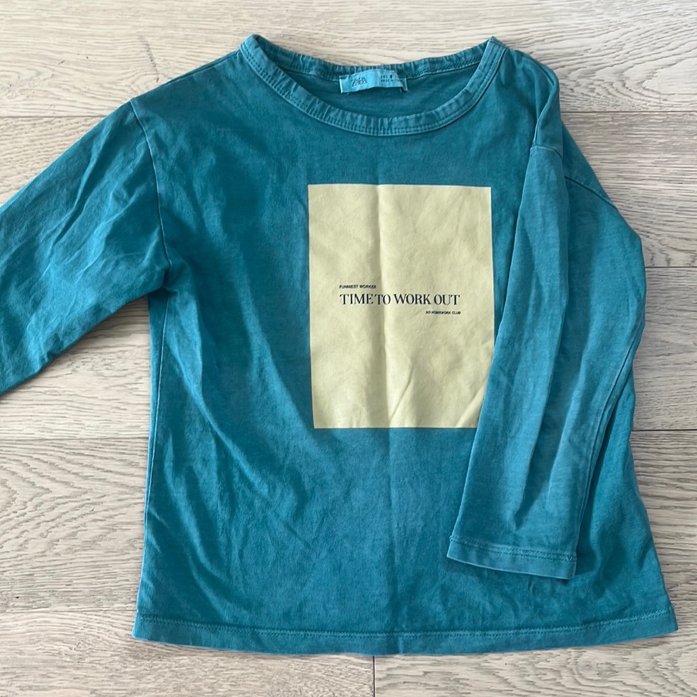 Long sleeved green shirt